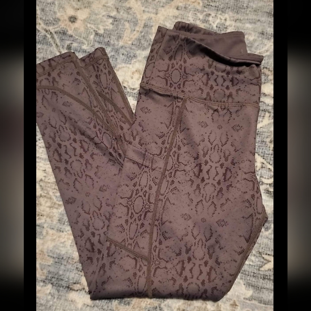 Purple snakeskin leggings size small